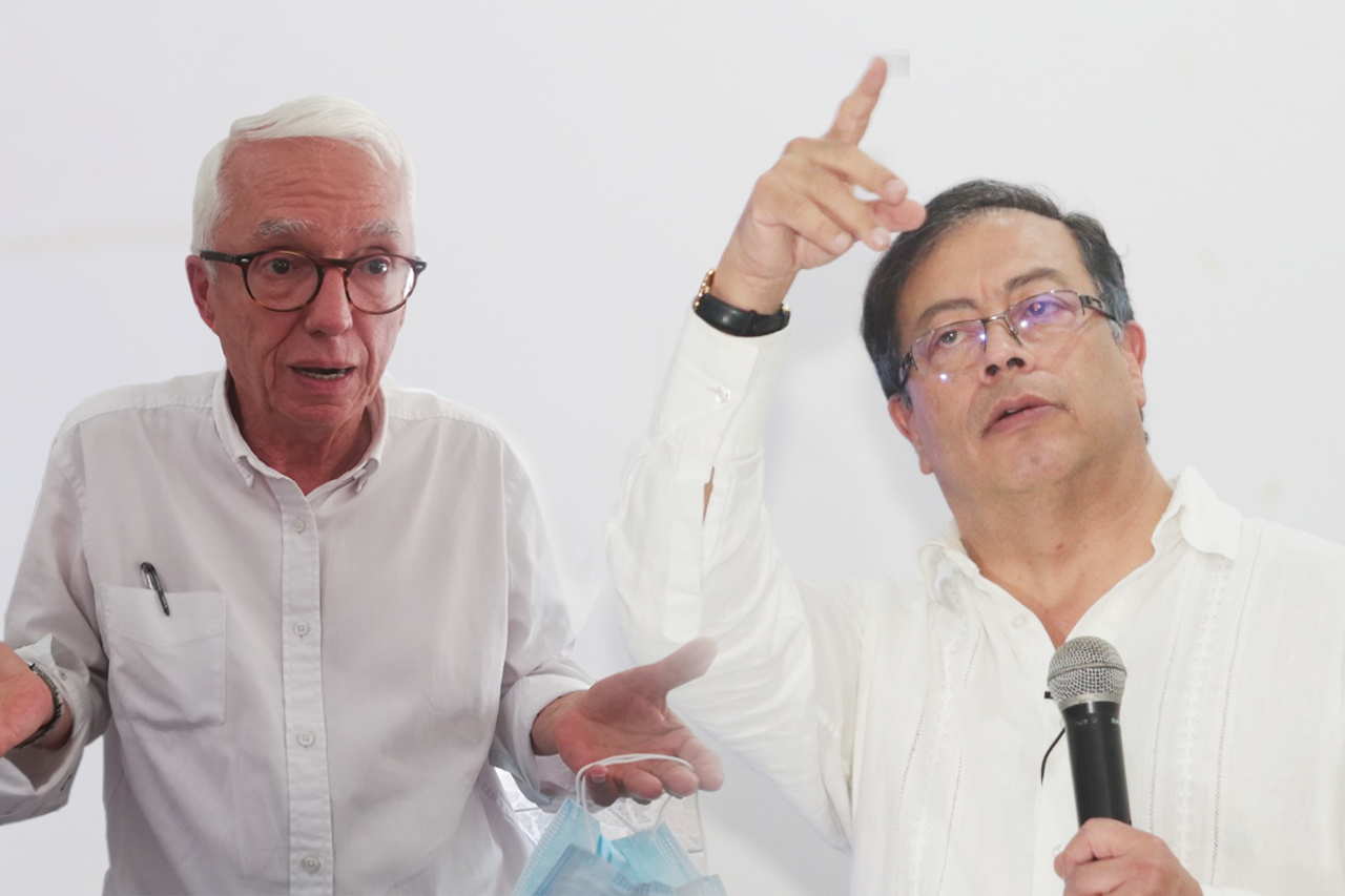 dos personas con camisa blanca, politicos de colombia, robledo y petro